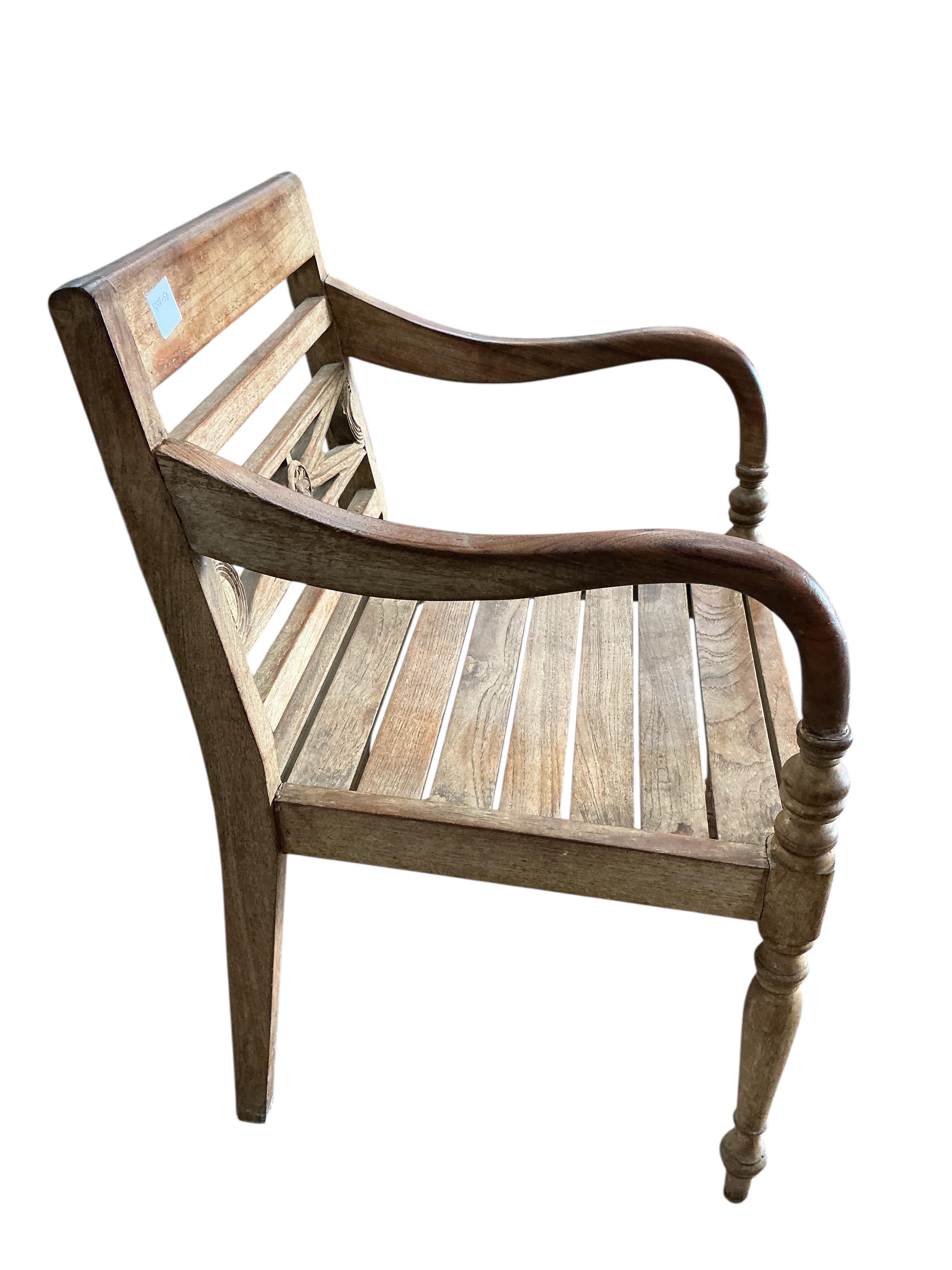 An Anglo-Indian hardwood elbow chair, width 53cm, height 84cm